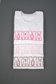 Professionally embroidered MAMA tees These are WHITE shirts with HOT PINK, LIGHT PINK, AND ROSE GOLD  Choose which color combination you would like from the drop down These are embroidered on comfort colors shirts UNISEX FIT  SHORT SLEEVE 100% RINGSPUN COTTON Want a different color? Checkout our shop for other color options!  Want a different word? Just message us & we will let you know if we can! White Tops With Embroidered Graphics For Mother's Day, White Tops With Letter Embroidery For Spring, Embroidered White Tops For Mother's Day, White Tops With Letter Embroidery For Mother's Day, White Embroidered Tops For Mother's Day, White Letter Embroidery T-shirt For Spring, White T-shirt With Letter Embroidery For Spring, Family Matching White T-shirt With Embroidered Text, White Family Matching T-shirt With Embroidered Text