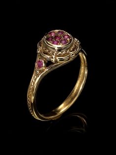 Unique victorian antique style 14K ring with 9 small canter ruby stones. Vintage ring. Top width : 1cm. *14K Solid Gold, we don't offer any plated or gold filled jewellery at all. Free Shipping for all orders . I offer a lifetime craftsmanship warranty on all of my jewellery. I resize all rings for life free of charge. Heirloom Gold Ruby Ring With Rose Cut Diamonds, Heirloom Ruby Ring With Rose Cut Diamonds In Gold, Heirloom Ruby Diamond Ring, Intricate Ruby Wedding Ring, Antique Ruby Ring With Rose Cut Diamonds, Victorian Yellow Gold Ruby Promise Ring, Yellow Gold Ruby Ring With Intricate Design For Promise, Classic Ruby Ring With Rose Cut Diamonds For Wedding, Formal Ruby Cluster Ring With Rose Cut Diamonds