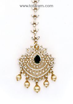 18 karat gold "detachable" diamond maang tikka cum pendant - papidi billa with color stones & south sea pearls
  
  this product can be used as pendant.
  this product has inter changeable stones in the pendant.
  gross gold weight of the pendant without chain : 12.100 grams
  diamond weight in the pendant :1.09 carats
  number of diamonds in the pendant : 250 pcs
  gross gold weight of the diamond tikka chain without pendant : 5.550 grams
  diamond weight in the tikka chain : 0.86 carats 
  num Diamond Tikka, Diamond Maang Tikka, Papidi Billa, Maang Tikka, Color Stones, South Sea Pearls, Sea Pearls, South Seas, Stone Color