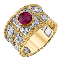 This spectacular ruby and diamond band has all the hallmarks of a timeless piece of heirloom jewelry. Made in Italy of 18k yellow and white gold, this ring features a superfine Burmese color ruby weighing 1.68 carats, set in a beautifully detailed 18k yellow gold bezel. The ruby has intense color and exceptional brilliance, which is highlighted by the intricate, masterful gold craftsmanship and the striking combination of brilliantly engraved white and yellow gold. This ring has a wide band and Luxury Red Diamond Ring With Single Cut Diamonds, Luxury Ruby Ring With Center Stone For Anniversary, Luxury Yellow Gold Ruby Ring With Center Stone, Luxury Yellow Gold Ruby Ring With Brilliant Cut, Luxury Ruby Round Cut Rings, Luxury Ruby Ring With Brilliant Cut For Anniversary, Luxury Ruby Ring For Anniversary, Heirloom Red Diamond Rings With Single Cut, Heirloom Red Rings With Single Cut Diamonds