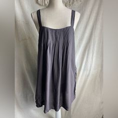 Novella Royale Gray Sleeveless Tie Sides Mini Dress Size P/S Brand New With Tags, No Flaws. Features: Sleeveless, Square Neck, Swim Beach Cover Up, 100% Rayon, Hand Wash Cold, Dark Charcoal / Gray Color, Summer Pit To Pit: 21" Length: 33" Submit An Offer To Purchase And Add 2 Or More Items To A Bundle For 25% Off! Casual Camisole Dress With Built-in Bra, Sleeveless Sundress With Built-in Bra For Vacation, Summer Cami Mini Dress With Built-in Bra, Chic Cami Slip Dress For Beach, Chic Cami Beach Slip Dress, Casual Camisole Slip Dress For The Beach, Sleeveless Beach Camisole With Built-in Bra, Sleeveless Slip Dress With Built-in Bra For Summer, Summer Sundress Mini Dress With Camisole Shape