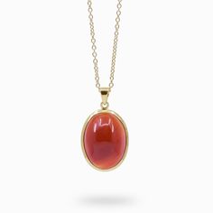 CARNELIAN NECKLACE WITH GOLD VERMEIL FINISH Oval Agate Necklace For Healing, Elegant Carnelian Necklace With Polished Finish, Spiritual Oval Cabochon Gemstone Necklaces, Spiritual Oval Cabochon Necklace, Spiritual Oval Agate Necklace, Oval Red Carnelian Jewelry, Red Agate Gemstone Necklace, Red Carnelian Jewelry With Cabochon, Natural Stones Necklace With Oval Cabochon