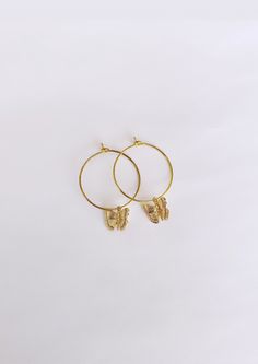 ♥Beautiful 24k Gold Plated butterfly earrings! ♥Available in hoops, huggies, or hooks. ♥Handmade with love <3 Dangle Hoop Earrings With Butterfly Charm As A Gift, Butterfly Charm Huggie Earrings For Gifts, Gold Huggie Earrings With Butterfly Charm, Dainty Huggie Earrings With Butterfly Charm, Dainty Hoop Earrings With Butterfly Charm, Everyday Dainty Earrings With Butterfly Charm, Dainty Huggie Jewelry With Butterfly Charm, Everyday Gold Butterfly-shaped Jewelry, Hypoallergenic Butterfly-shaped Yellow Gold Jewelry