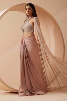 Roqa | Estella Off-White Drape Sari And Cape | INDIASPOPUP.COM Pleated Skirt Outfit Indian Wedding, Diy Lehenga, Dhoti Skirt, Chiffon Blouses Designs, Embroidered Bustier, Cape Set, Pink Cape, Trendy Outfits Indian, Indian Sari Dress