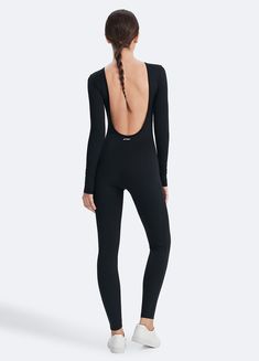 Trendy High Stretch Bodysuit For Loungewear, Versatile Black Stretch Jumpsuits And Rompers, Casual Black Sports Jumpsuits And Rompers, Casual Black Jumpsuits And Rompers For Gym, Casual Black Jumpsuits And Rompers For Sports, Black Casual Unitard For Sports, Casual Black Unitard For Sports, Casual Black Sports Unitard, Casual Bodysuit With Minimal Stretch For Spring