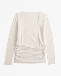 Slim-fitting long-sleeve maternity top in our double-layered softAF cotton-blend seamless fabric, featuring ruching details along the bodice and square neckline. Our cotton-blend seamless fabric is an ultra soft, brushed jersey fabric, that gives you a casual seamless look! Beige Ruched Stretch Top, Versatile Long Sleeve Top With Soft Stretch, Versatile Soft Stretch Long Sleeve Top, Versatile Long Sleeve Ruched Top, Soft Long Sleeve Tops For Spring, Long Sleeve Stretch Tops For Brunch, Stretch Long Sleeve Tops For Brunch, Versatile Stretch Tops For Brunch, Spring Solid Color Nursing Tops