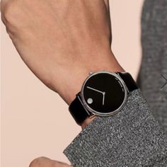 Movado Modern Mens Watch Stainless Steel Case, Black Museum Dial And Black Calfskin Strap. Classic Black Watch With Polished Finish, Black Minimalist Watch Accessories For Formal Occasions, Black Watches With Polished Finish And Round Dial, Minimalist Black Watch For Formal Occasions, Masculine Black Quartz Watch, Modern Black Polished Watch Bands, Classic Black Watch Bands With Palladium Hardware, Modern Black Watch Bands With Polished Finish, Formal Black Watches With Diamond Hour Markers