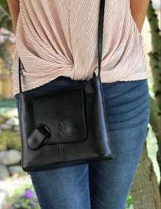 This crossbody bag is on the smaller size (9.5 x 7.5 inches) - perfect when you're on the go. The quality in the leather and stitching is excellent! A beautiful purse made in Florence Italy with a unique design. The bag is light and items are kept secure with the zip closure coupled with the flap. Small zip wall pockets inside and out, plus adjustable strap. #italianleathercrossbodybag #leathercrossbodypurse #italianleatherhandbags #italianleatherhandbagsforwomen #italianleatherbags #verapelle Casual Leather Flap Bag For On-the-go, Elegant Flap Shoulder Bag For On-the-go, Elegant Everyday Satchel With Cell Phone Pocket, Trendy Leather Flap Bag For Travel, Trendy Travel Flap Bag With Magnetic Closure, Elegant Satchel With Cell Phone Pocket, Elegant Satchel With Cell Phone Pocket For Everyday Use, Elegant On-the-go Satchel With Cell Phone Pocket, Versatile Leather Satchel With Cell Phone Pocket