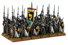 a group of knights with swords and shields