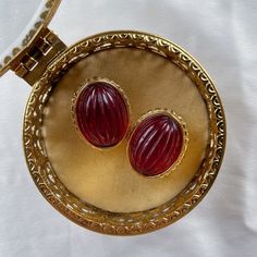 Very good vintage condition, signed, heavy with red glass cabochon. Rare find.Disclaimer: This item is an Estate/Antique Sale/Fair Find. Item is described to the best of my ability. Please contact me if you have any questions or wish to see additional photos prior to buying. Thank you! Vintage Oval Cabochons For Formal Occasions, Vintage Red Clip-on Earrings, Red Vintage Clip-on Earrings, Vintage Cabochon Earrings For Formal Occasions, Vintage Cabochon Clip-on Earrings For Gift, Vintage Cabochon Clip-on Earrings, Vintage Clip-on Cabochon Earrings As Gift, Vintage Cabochon Clip-on Earrings As Gift, Handmade Oval Vintage Earrings