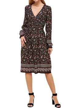 The Bohemian Printed Midi Dress from Iconic Luxe combines artistic flair, comfort, and practicality. Its unique design elements and Bohemian-inspired prints make it a standout choice for expressing your individual style. This dress is versatile and can be dressed up or down. It's suitable for casual outings, daytime events, or even dressed up for special occasions, depending on your styling choices. To complete your look, consider adding accessories such as delicate necklaces, oversized sunglasses, a wide-brimmed hat, and comfortable sandals . You can also experiment with a fringed bag and ankle boots. 100% Rayon Imported Zipper closure Hand Wash Only Features: deep V-neckline, long sleeves with elastic and ruffles details, front shirring, midi length, back zipper, paisley print Suit for: Bohemian Paisley Print Midi Dress For Fall, Multicolor Vintage Print Dress, Casual Boho Print Patterned Midi Dress, Bohemian Midi Dress With Abstract Print For Spring, Spring Bohemian Midi Dress With Abstract Print, Bohemian Flowy Patterned Midi Dress, Bohemian Patterned Maxi Dress With Abstract Print, Patterned Midi Dress With Paisley Print, Hippie Floral Print Patterned Dress