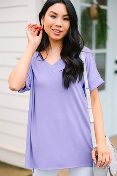 This versatile v-neck tee is here to make your life easy! It's honestly the perfect top for year round styling and layering. You can knot the hem or half tuck into your favorite jeans or shorts. You can layer it with all sorts of jackets, shackets, or kimonos. And don't even get us started on accessories! The options are absolutely endless! This top is truly a staple piece! This top features a v neckline, short cuffed sleeves, and a generous fit. Material has generous amount of stretch.Cindy is Purple V-neck Solid Top, Purple V-neck Solid Color Top, Purple V-neck Top, Casual V-neck Top For Spring Layering, Casual Solid Color V-neck Top For Spring, Purple V-neck Top For Day Out, Casual V-neck Top For Spring, Spring Everyday V-neck Top, Spring V-neck T-shirt For Loungewear