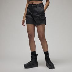 Keep your style game on point with these go-to shorts. Comfort meets functionality with a smooth, water-repellent twill fabric and cargo-style pockets. We added a dash of classic Jordan style for good measure. Black Cargo Shorts With Side Pockets, Black Bermuda Shorts With Side Pockets, Sporty Cargo Bottoms Short Length, Sporty Cargo Style Short Length Bottoms, Black Nylon Utility Shorts, Sporty Nylon Shorts With Hip Pockets, Black Short-length Cargo Pants For Outdoor Activities, Techwear Cargo Shorts With Multiple Pockets, Black Nylon Cargo Shorts With Pockets