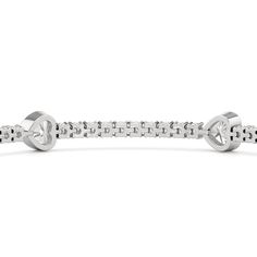 A picture of romance and indulgence. This diamond tennis bracelet is comprised of round diamonds, each on claw prongs, forming a straight but flexible line. Several heart-shaped diamonds, each secured by a bezel, sit at evenly spaced stations, breaking the line with its impressive brilliance. Claw Prong, Floral Pendant, Heart Shaped Diamond, Tennis Bracelet Diamond, Tennis Bracelet, Gold Platinum, Earrings Collection, Three Stone, Lab Diamonds