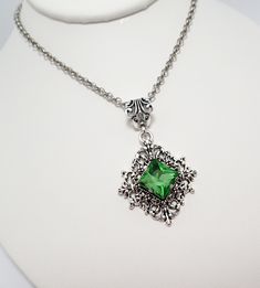 "This is a new handmade pendant. It is made with antiqued silver plated filigrees, featuring a high quality LIGHT PERIDOT GREEN glass rhinestone/jewel that sparkles like crystal. Pendant measures 2 1/4\" tall (including the decorative bail) and 1 3/8\" wide and is worn on a sturdy rolo chain in your choice of length. This is also available in a variety of stone colors in our store, along with matching earrings." Gothic Green Jewelry For Gifts, Green Gothic Jewelry For Gifts, Green Gothic Jewelry Gift, Green Gothic Style Jewelry Gift, Gothic Nickel-free Jewelry For Weddings, Gothic Nickel-free Wedding Jewelry, Victorian Filigree, Goth Steampunk, Antique Silver Necklace