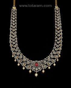 18 karat gold 'detachable / 4 in 1' diamond long necklace with color stones & culture pearls
      it can also be used as a short necklace
  length of the short necklace without back chain : 7.00 inches
  this product has a detachable pendant which can be used as a separate pendant with most chains.
  this product has inter changeable stones in the necklace and pendant.
   length of the pendant : 2.95 inches
  width of the pendant : 2.25 inches

  

introducing our exquisite 18 karat gold 'detac Traditional Diamond Necklace With Single Cut Diamonds For Celebration, Festival Diamond Necklace With Single Cut Diamonds, Diamond Necklace For Reception And Festivals, Diamond Necklace For Receptions And Festivals, Temple Style Diamond Necklace For Reception, Festival Diamond Necklace For Receptions, Festival Reception Diamond Necklace, Traditional Diamond Bridal Necklace With Gemstones, Traditional Bridal Necklace With Diamonds And Gemstones