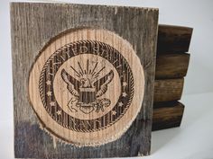 two wooden coasters with the seal of the united states on one side and an eagle on the other