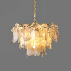 Metavaya Chandelier Dia 60cm x H 40cm / ∅ 23.6″ x H 15.7″ (round canopy) / Gold & Textured Clear Glass Rondini Chandelier 662668876603 M202403184-2 Rondini Chandelier- Buy online Glass Lamps, Gold Texture, Glass Lighting, Edison Light Bulbs, Glass Lamp, Led Bulb, Clear Glass, The Light, Lounge