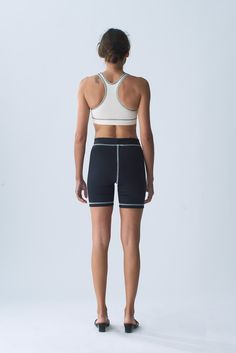 Our Organic Cotton Sport Bra provides full coverage, comfort and support for all activities. Finished with a racer back and 1 1/4 inch encased elastic hem. The Organic Cotton Sport Bra is manufactured in New York City. Fit notes – The Organic Cotton Sport Bra fits true to size, we recommend to take your normal size in a bra or sports bra style. Please follow measurements below to understand sizing. All measurements are in inches before stretch. Recommended Bra Sizing Across Chest Lying Flat (Pit Sporty T-back Activewear For Training, Sporty Fitted T-back Sports Bra, Sporty Racerback Activewear With Built-in Padding, Padded Athleisure Activewear For Sports, Padded Athleisure Activewear For Light Sports, Compressive Padded Activewear For Sports, Padded Sporty Racerback Activewear, Sporty Padded Racerback Activewear, Padded Medium Support Activewear For Sports