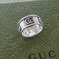 Gg Marmont Cabled Sterling Silver Band Ring Size 16 Us Size 7.5 Has Tiny Dent That Can Easily Be Fixed It Shows In The Last Pic It’s Not Noticeable When You Wear It Gucci Sterling Silver Ring For Formal Occasions, Gucci Sterling Silver Ring, Gucci Luxury Silver Rings, Luxury Silver Gucci Rings, Gucci Silver Sterling Silver Rings, Classic Gucci Ring Jewelry, Classic Gucci Ring, Classic Gucci Sterling Silver Rings, Gucci White Gold Sterling Silver Ring