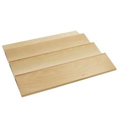 two unfinished plywood boards sitting on top of each other in front of a white background