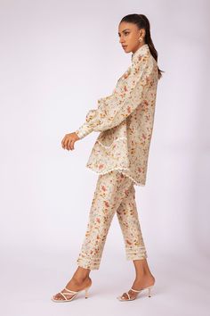 Meeha – Sania Maskatiya International Spring Silk Pant Set With Printed Motifs, Summer Silk Floral Print Pant Set, Summer Silk Pant Set With Floral Print, Spring Silk Pant Set With Long Sleeves, Sets With Blouson Long Sleeves, Spring Sets With Blouson Sleeves, Elegant Floral Print Fall Sets, Feminine Long Sleeve Sets For Daywear, Spring Floral Embroidered Long Sleeve Pant Set