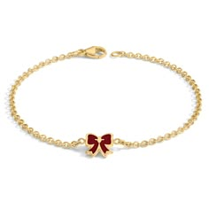 This piece combines timeless design with a modern twist, making it a must-have for those who love a pop of color. Features Delicate 2mm Chain: Perfectly sized for subtlety and grace, the 2mm chain offers a versatile addition to any bracelet stack. Elegant Vitreous Enamel Heart: At its core, a beautifully crafted gold bow adorned with vitreous enamel stands as a symbol of love and affection, adding a vibrant pop of color and a unique texture that sets this necklace apart. Versatile and Timeless: Ribbon Bracelet, Red Orchids, Ribbon Bracelets, I Attract, Vitreous Enamel, Expensive Jewelry Luxury, Bow Bracelet, Apple White, Luxe Jewelry