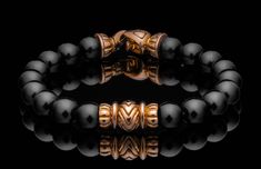 Indulge in the radiance of our 'Pilas' beaded bracelet. Inspired by Mayan Deco Revival architecture, this piece features black onyx beads flanked by lustrous 18k rose gold end caps and focal bead inspired by Aztec and Mayan geometry. This bracelet exudes luxury with a nod to timeless heritage and contemporary design, inviting you to adorn yourself with history reimagined. Engraved Knife, Bracelet Inspired, Revival Architecture, Rose Gold Beads, Skull Jewelry, Onyx Bead, Focal Bead, Hand Engraving, Small Leather Goods