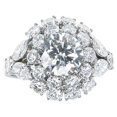 A Van Cleef & Arpels GIA Certified 1.86 ct. Center Diamond Ring made in Platinum. The diamond is K color, VVS 2 clarity. The side diamonds total appx. 4 carats. The total weight is 7.50 grams. The ring size is US 7.50. Van Cleef Ring Engagement, Van Cleef Wedding Ring, Van Cleef Perlee Ring, Van Cleef And Arpels Jewelry Rings, Van Cleef High Jewelry, Van Cleef & Arpels, Van Cleef And Arpels, Band Engagement Ring, Van Cleef Arpels