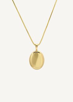 Home is where the heart is. Our Maison Gold Lockets are heirlooms that represent a moment in time. Keep this locket as a family heirloom forever. Wear her blank or get her engraved with your signature letter. To engrave more than one letter, visit HERE.Complete the look with a Rolo Link Chain Necklace or a Box Chain Necklace. Photo dimensions: 14mm x 11.5mmTo add a photo inside, simply open the locket and carefully press the photo into place. Our lockets do not have a separate opening for a phot Classic 14k Gold Locket Necklace Keepsake, Classic 14k Gold Locket Necklace For Keepsake, 14k Gold Locket Necklace With Oval Pendant For Anniversary, Timeless Pendant Locket Necklace For Anniversary, Timeless Pendant Locket Necklace For Keepsake, Heirloom Oval Link Necklace With Polished Finish, Timeless Keepsake Locket Pendant Necklace, Timeless Keepsake Pendant Locket Necklace, Timeless Gold Oval Locket Necklace