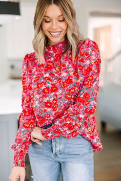 We can't change this blouse nor would we want to! It's gorgeous! That floral print is so vibrant and feminine! This blouse also has a very classic fit that we can't get over! You are going to love wearing this beauty for a day at work or for grabbing lunch with a friend! This blouse features a round neckline, long sleeves, and a floral print. Material has no amount of stretch.Cam is wearing the small. Multicolor Feminine Blouse With Ditsy Floral Print, Feminine Multicolor Floral Print Blouse, Fall Ditsy Floral Print Blouse, Chic Ditsy Floral Print Tops For Fall, Feminine Long Sleeve Floral Print Top, Fitted Blouse With Ditsy Floral Print For Fall, Fitted Vibrant Print Blouse For Day Out, Fitted Blouse With Vibrant Print For Day Out, Feminine Ditsy Floral Print Tops For Fall