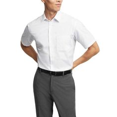 He'll be dressed in style and comfort with this men's Van Heusen poplin short sleeve dress shirt. Click on this MEN'S GUIDE to find the perfect fit and more! He'll be dressed in style and comfort with this men's Van Heusen poplin short sleeve dress shirt. Click on this MEN'S GUIDE to find the perfect fit and more! FEATURES Button front Wrinkle free Cuffed Short sleeve 1 chest pocketFIT & SIZING Regular fitFABRIC & CARE 65% recycled polyester, 35% cotton Machine wash ImportedRESPONSIBLE Tested fo Office Shirt With Pockets And Short Sleeves, Solid Color Short Sleeve Dress Shirt For Summer, Fitted Short Sleeve Dress Shirt For Summer, Solid Color Short Sleeve Summer Dress Shirt, Fitted Short Sleeve Summer Dress Shirt, Formal Short Sleeve Shirt For Summer, Short Sleeve Business Shirt For Summer, Elegant Short Sleeve Dress Shirt For Semi-formal Occasions, Summer Short Sleeve Dress Shirt For Work