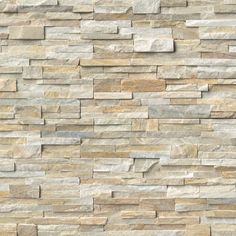 a stone wall that looks like it is made out of different types of stones