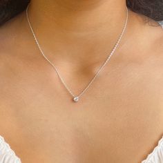 Our bezel solitaire necklace is available in sterling silver or 14KT gold vermeil. Materials: 925 sterling silver or 14KT gold vermeil Vermeil: 14KT yellow gold plating over 925 sterling silver Gemstone: Cubic Zirconia Closure: Spring ring Length: Adjustable length 16" to 18" Follow us on Instagram @pennyweightsjewelry Follow us on Facebook @facebook.com/pennyweights Follow us on Pinterest @pennyweights Click on the links at the bottom left of this page! Everyday White Gold Solitaire Jewelry, Sterling Silver Solitaire Necklace With Prong Setting For Everyday, Everyday Sterling Silver Solitaire Necklace With Prong Setting, Sterling Silver Solitaire Necklace For Everyday, Delicate Diamond White Solitaire Necklace In Sterling Silver, Everyday Solitaire Cubic Zirconia Jewelry, Silver Prong Set Diamond Necklace For Everyday, Silver Solitaire Necklace With Birthstone, Round Birthstone Necklace Fine Jewelry