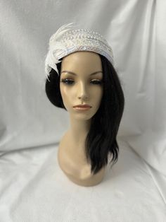 This is a vintage inspired Juliet cap style 1950s - 1960s white iridescent sequin fascinator half hat with a feather  flower ideal for wedding, bridal tea party, mother of the bride, COGIC church hat or any other formal special occasion. Lightweight Design to  be worn either side  Alligator clips underneath or elastic band Easy to wear Can be worn tilted on either side towards the face, as a Fascinator hat. Vintage style in the center of head.  Approx: 15" side by side and 7.5" back and front. White Vintage Fascinator For Royal Ascot, Vintage White Hat Headpiece, Vintage White Costume Hats And Headpieces For Wedding, Vintage White Costume Hats For Wedding, Vintage White Headpiece For Kentucky Derby, Vintage White Wedding Costume Hats And Headpieces, Vintage White Formal Headpieces, White Vintage Headpiece For Formal Occasions, White Hat For Vintage Events