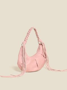 Made from faux leather, our Cocoon Small bag is a slouchy design with creased detailing. It hangs from a braided crossbody strap that Chic Fringed Crossbody Hobo Bag, Chic Crossbody Hobo Bag With Fringe, Chic Fringe Hobo Bag, Chic Fringe Crossbody Shoulder Bag, Chic Crossbody Shoulder Bag With Tassels, Chic Shoulder Bag With Tassels For Daily Use, Chic Tassel Crossbody Shoulder Bag, Chic Hobo Shoulder Bag With Long Strap, Chic Fringe Hobo Bag For Everyday