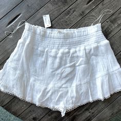 Cute White Aeropostale Skirt/Skort. Never Worn Nwt Size Large Beach Cotton Skort With Ruffled Skirt, Cotton Beach Skort With Ruffled Skirt, Summer Beach Mini Skirt With Lace Trim, Cotton Ruffled Skort For Beach, High Waist Cotton Mini Skirt For Beach, High-waist Cotton Mini Skirt For Beach, Vacation Flowy Skirt With Lace Trim, Flowy Skirt With Lace Trim For Vacation, Cotton Flowy Short Skirt