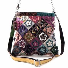 Brand New Vintage Me Floral Chic Crossbody/Messenger Bag Genuine Leather Floral Chic Cross Body Bag This Cross Body Bag Is So Cute. Practical, Trendy And Oh Sooo Chic! Genuine Multi-Color Floral Bling Studded Leather Bag Combination Of Colors Dimensions: 10"L X 1.5"W X 9"H, 13.5" Drop Strap Includes (2) Removable (Chain Or Leather) Adjustable Straps Interior: 1 Side Zipper Pocket & Slip Pocket Divider Zipper Closure No Two Bags Alike In Colors - Every Bag Unique Studded Leather Bag, Messanger Bag, Chic Crossbody Bag, Leather Floral, Crossbody Messenger Bag, Studded Leather, Cross Body Bag, New Vintage, Body Bag