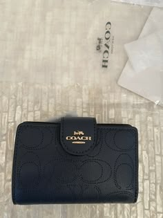 Coach Medium Corner Zip Wallet In Signature Leather C4768 Im/Midnight. Condition is "New with tags". Signature perforated leather and smooth leather Seven credit card slots Bill compartment ID window Snap closure Zip coin pocket 5" (L) x 3 1/2" (H) x 1/2" (W) Style No. C4768 .Shipped with USPS Priority Mail. Window Snap, Chirstmas Gift, Cute Wallet, My Style Bags, Juicy Couture Purse, Cute Wallets, Coach Wallet, Wallet Pouch, Pretty Bags