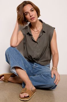 Elevate your everyday tops with this easy button-down from EVEREVE. Crafted in Lyocell, this top features a spread collar, a sleeveless silhouette with bra-friendly gussets at the arm holes, and a flattering twist at the hemline. Green Satin Top, Satin Top Blouses, Leather Blouse, Crinkle Top, Crossover Top, Green Long Sleeve Top, Black Mesh Top, Exclusive Dress, Leopard Print Blouse