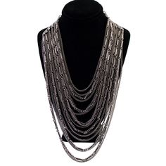 A vintage layered chain silver tone necklace. This is a fun piece that looks great on. It has a hook clasp and can be worn at adjustable lengths. The shortest chain is 15.75 inches long. In good condition. Silver Chunky Multi-strand Necklace, Silver Chain Link Layered Necklace, Silver Multi-strand Chunky Chain Necklace, Silver Multi-strand Chunky Chain Layered Necklace, Silver Multi-strand Layered Necklace For Party, Silver Chunky Chain Multi-strand Layered Necklace, Silver Multi-strand Layered Necklace With Chunky Chain, Silver Multi-strand Necklace With Chunky Chain, Silver Multi-strand Metal Chain Necklace