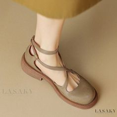 Summer Brown Closed Toe Mary Janes, Summer Mary Jane Flats With Round Toe, Casual Summer Mary Janes With Round Toe, Trendy T-strap Sandals With Round Toe And Heel Strap, Casual Beige Flats With Ankle Strap, Summer Slip-on Mary Jane Flats, Summer Closed Toe Mary Jane Flats, Adjustable Beige T-strap Sandals With Round Toe, Beige Adjustable T-strap Sandals With Round Toe