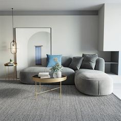 a living room filled with furniture and a round coffee table