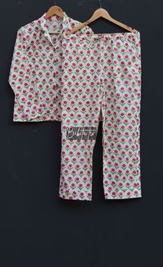 "Designed and customized in our India store, the love and care we put into every PJ will stand out to you at the moment you see it. Full sleeve shirt with buttons and loose fit trousers. Completely handmade in Jaipur from 100% pure cotton fabric. Comes in S/M/L/XL sizes, but without any complications can be adjusted to individual measurements. Note: The color and brightness of actual product may vary due to digital photography and photo editing. We crossed check each and every product before lis Cotton Night Suit, Night Wear Dress, Full Sleeve Shirt, Loose Fit Trousers, Shirt With Buttons, Cotton Pjs, Adult Pajamas, Floral Pajamas, Pyjama Sets