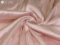 Blush Pink Pure Dupioni Fabric Raw Silk by the Yard Indian Wedding Dresses Pillow Cover Drapery Blouses Curtains Cushions Costume sewing ➤Color:  Bridal Blush Pink. ➤Quality: The fabric is 100% dupioni silk of the highest grade. (100gsm) ➤Width: 44 inches ➤Code: sf346 ➤Listing for 1 Yard of fabric Bridal Blush Pink silk or raw silk fabric, made from pure silk yarn. This is a very beautiful tone-on-tone Blush Pink. Indian dupioni silk or raw silk fabric, made from pure silk yarn. 100% pure silk fabric has been made in India. This dupioni is perfect for bridal & bridesmaids dresses, drapery, quilting, pillows, & chair upholstery, Dresses, Tops, Blouses, Jackets, Crafting, Clutches or Evening Bags, Embellish your clothes, Home Décor, Outdoor, Quilting, Sewing, General etc use it for scrap boo Quilting Pillows, Dupioni Silk Fabric, Wedding Dress Costume, Drapery Curtains, Indian Wedding Dresses, Costume Sewing, Raw Silk Fabric, Silk Cushions Covers, Waist Coat