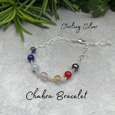 "You will receive one of These beautiful gemstone bead chakra bracelets individiually wire wrapped gemstone beads with sterling silver, chain and a sturdy trigger clasp. Created in our Jewellery studio in Exeter, Devon. (Handmade) Max length 19.5cm or 7 3/4\", but can be clipped at any point in the chain up to that length 6mm round beads Please check these measurements on a tape measure / ruler to ensure you are happy with the size of the crystal. all measurements are approximate and may vary by a couple of millimetres.  Made with 6mm round beads in: Hematite (Root) Carnelian (Sacral) Citrine (Solar Plexus) Rose Quartz (Heart) Aquamarine (Throat) Lapis (Third Eye) Amethyst (Crown) and finished off with a clear quartz/rock crystal to amplify the other crystals. Hematite is extremely shiny a Jewellery Studio, Wire Wrapping Crystals, Rose Quartz Heart, Handmade Wire Wrapped, Chakra Meditation, Chakra Bracelet, Jewelry Studio, Bracelet Sterling Silver, Exeter