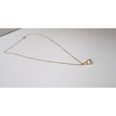 This is part of Chairish’s Fine Jewelry assortment.  A very beautiful white cultured pearl and 14-karat yellow gold necklace, circa mid-20th century. Pearl is very beautiful with a high luster. Pearl has a 14-karat yellow gold crown-like design attached to 14-karat yellow gold necklace. A beautiful piece to wear alone or stack with other necklaces. Very good condition as shown in images. No issues. Dimensions: pearl pendant is over 1/2" long x .25" Width. Necklace, from end to end, measures 19.2 Elegant Pear-shaped Drop Necklace For Formal Occasions, Classic Gold Pearl Necklace, Formal Gold-plated Jewelry With Pearl Pendant, Fine Jewelry Pear-shaped Drop Necklace For Formal Events, Gold Jewelry With Pearl Charm For Formal Occasions, Hallmarked Yellow Gold Pearl Necklace For Anniversary, Classic Yellow Gold Pearl Drop Necklace, Gold Akoya Pearl Necklace In Timeless Style, Refined Yellow Gold Pearl Necklace For Wedding