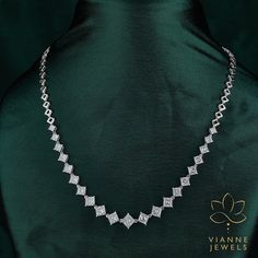 Dive into the realm of unparalleled brilliance and elegance with our stunning 16.16 Total Carat Weight Princess Cut Lab-Grown Diamond Necklace. Crafted with precision and love, each princess-cut diamond showcases a distinct square silhouette known for its sharp angles and beautiful symmetry, embodying both modernity and timeless allure. Not only is the princess cut known for its contemporary charm, but it also exudes a luminous sparkle that's hard to resist. With a total carat weight of 16.16, this necklace guarantees a lavish display of shimmer and sheen with every turn of your neck. Sustainably crafted, these lab-grown diamonds offer the same physical, chemical, and optical properties as mined diamonds. Being ethically sourced and environmentally friendly, they present a conscious choice Lab Grown Diamond Necklace, Luxury Bridal Necklace For Formal Occasions, Luxury Bridal Necklace With Diamond Accents, Luxury White Gold Bridal Necklace, Luxury Diamond White Bridal Necklace, Luxury Bridal Necklace With Vvs Clarity For Formal Occasions, Luxury Bridal Necklace With Vvs Clarity For Anniversary, Luxury Vvs Clarity Diamond Necklace For Wedding, Luxury Bridal Necklace With Diamond Cut For Anniversary