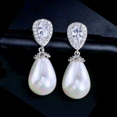 Pearl Wedding Jewelry - Pearl and Cubic Zirconia Bridal Earrings - Available in Rose Gold Modern Bride Jewelry, Cubic Zirconia Bridal Earrings, Jewel Makeup, Pearl Wedding Jewelry, Wedding Jewelry And Accessories, Iridescent White, Pearl Jewelry Wedding, Bridal Earrings Pearl, Bridal Event