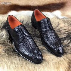 The classic brushed genuine crocodile lace-up Oxfords are lightened up by the leather shoe laces too. Genuine leather sole. Genuine leather inner lining.[custom tab] UPPER: 100% CROCODYLUS MISSISSIPIENSIS + SOLE: 100% LEATHER SOLE + FILLING: 100% CALF LEATHER [/custom tab] Lace-up Leather Shoes With Crocodile Pattern, Semi-formal Leather Shoes With Crocodile Pattern, Black Crocodile Pattern Wingtip Oxfords, Leather Crocodile Pattern Lace-up Dress Shoes, Leather Lace-up Dress Shoes With Crocodile Pattern, Formal Lace-up Leather Shoes With Crocodile Pattern, Semi-formal Leather Oxfords With Crocodile Pattern, Leather Wingtip Oxfords With Crocodile Pattern, Business Oxfords With Crocodile Pattern And Almond Toe